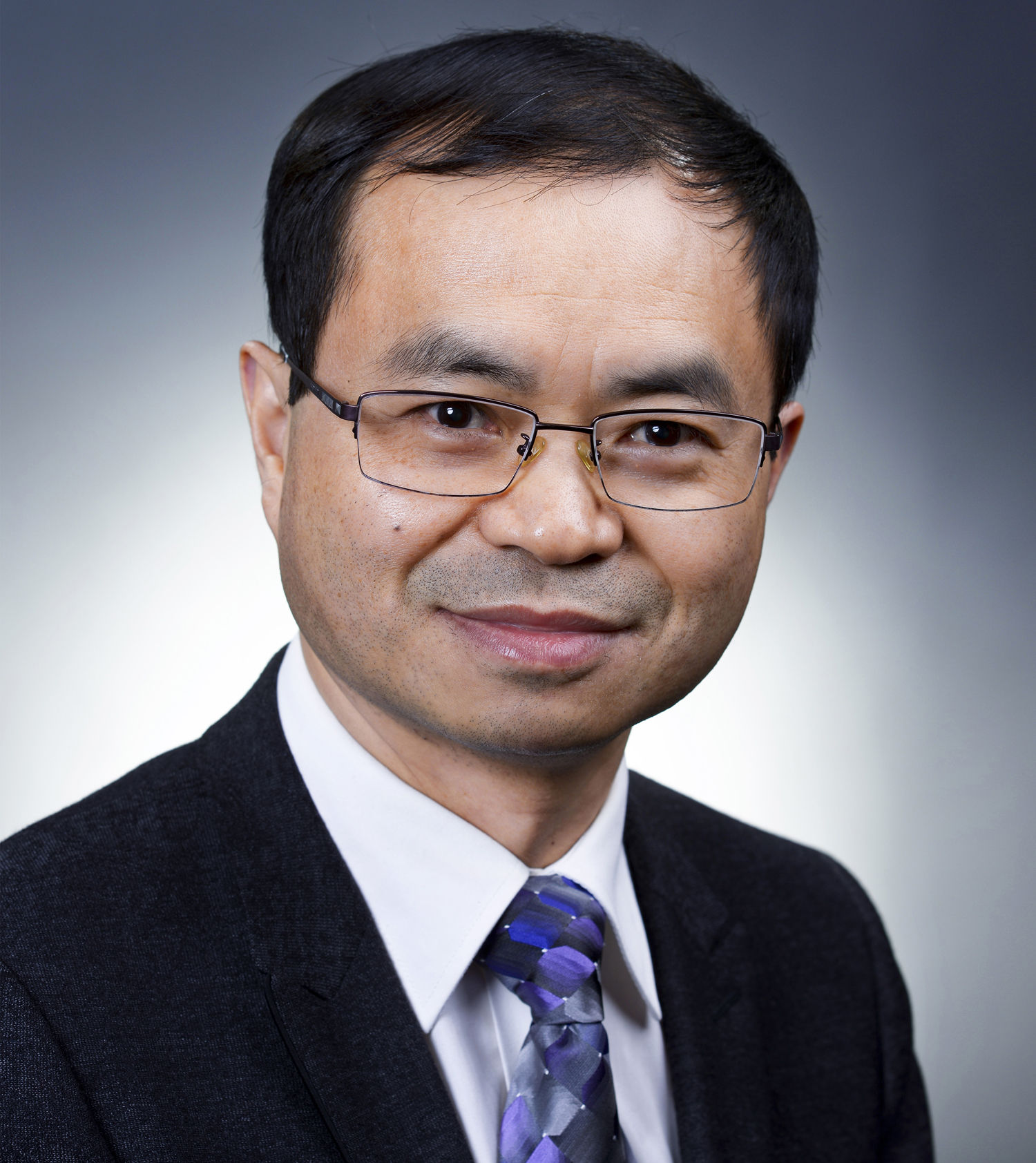 李老师学院照的照片.jpg